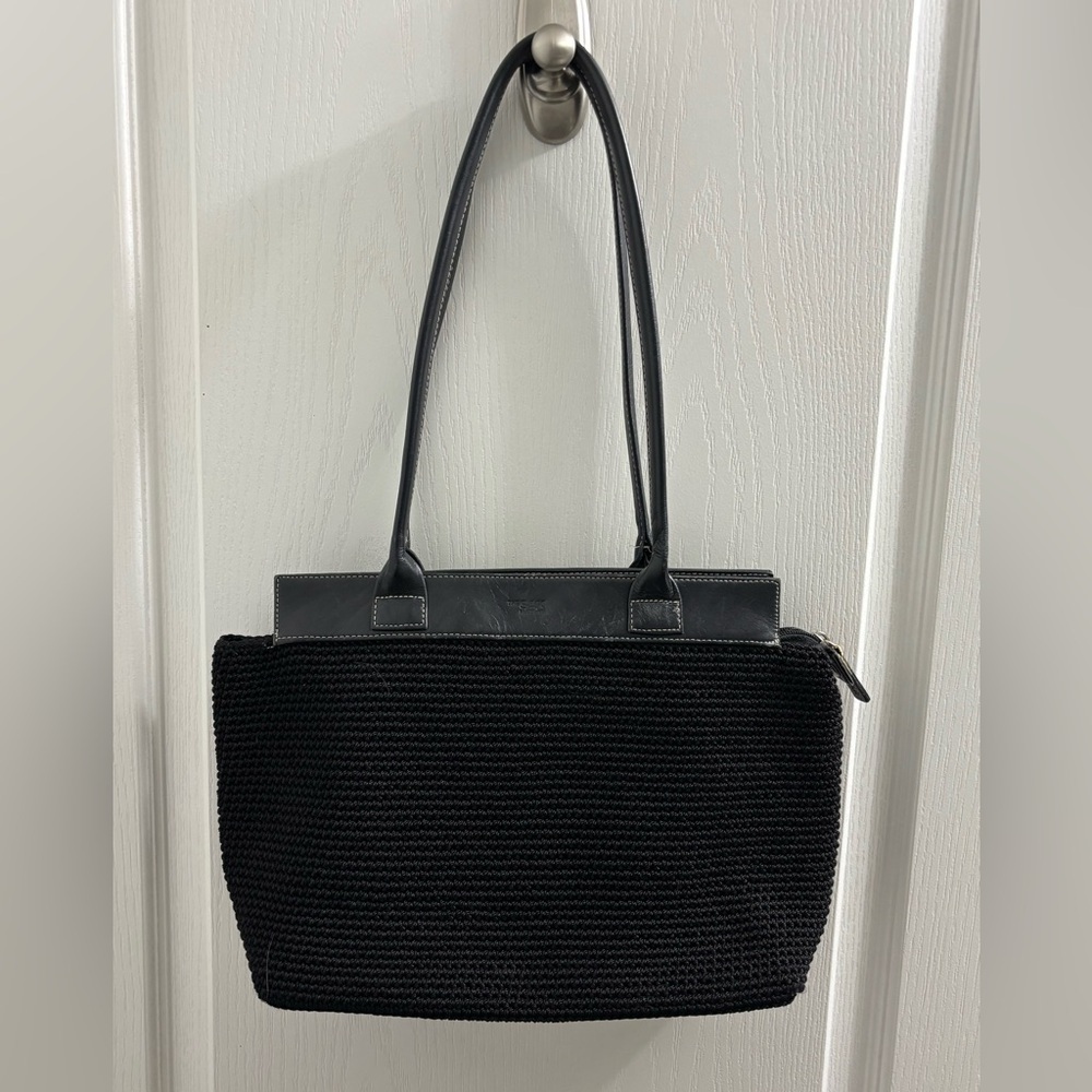 The Sak Crochet Black Shoulder Bag zippered with a snap